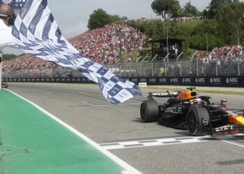Red Bull driver Max Verstappen of the Netherlands crosses the finish line to win the Italy's Emilia Romagna Formula One Grand Prix race at the Dino and Enzo Ferrari racetrack in Imola, Italy, Sunday, May 19, 2024. (AP Photo/Luca Bruno, Pool)