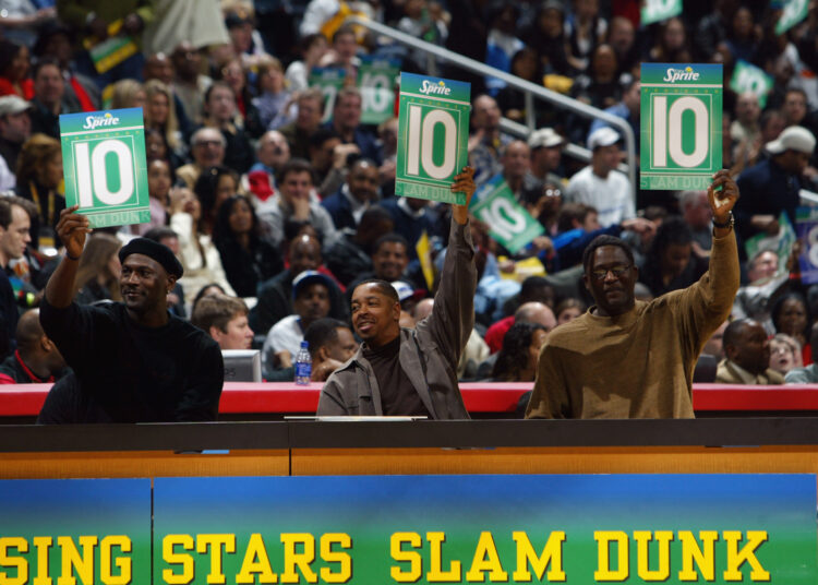 ATLANTA - FEBRUARY 8: (L-R) Michael Jordan, Anthony "Spud" Webb, and Dominique Wilkins judge the Sprite Rising Stars Slam Dunk Contest during the 2003 NBA All-Star Weekend at Philips Arena on February 8, 2003 in Atlanta, Georgia. NOTE TO USER: User expressly acknowledges and agrees that, by downloading and/or using this Photograph, User is consenting to the terms and conditions of the Getty Images License Agreement. (Photo by Jed Jacobsohn/Getty Images)